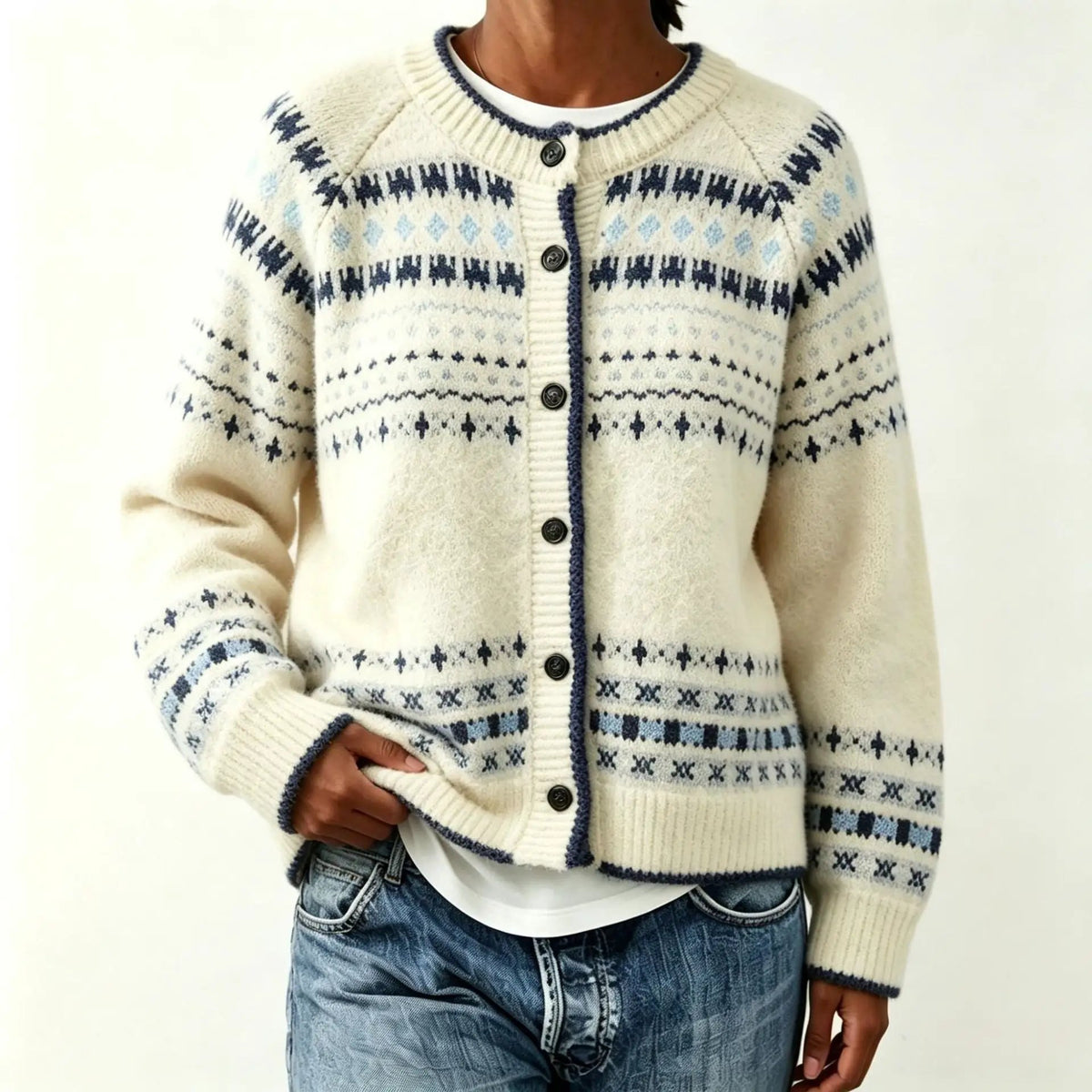 Color blocking round neck sweater by eprolo; cream knit with navy geometric pattern.
