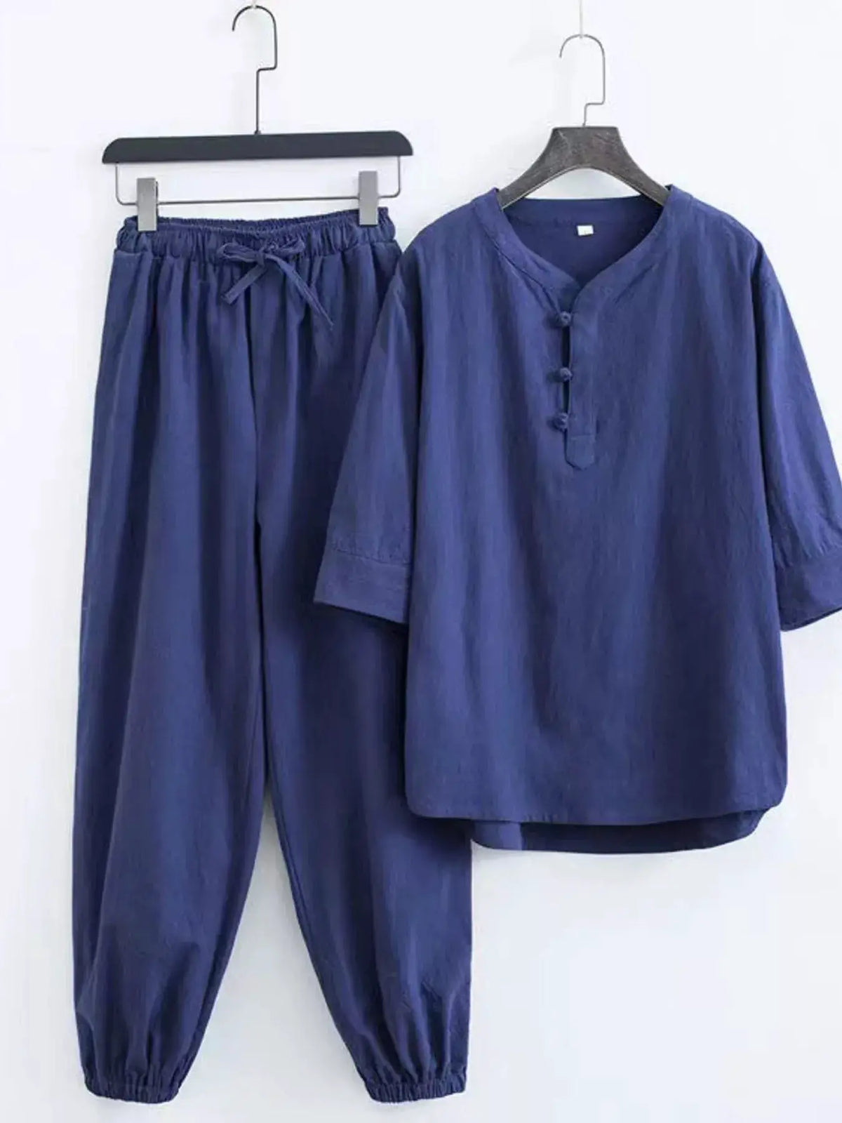 Men's plus-size navy blue Chinese-style pajama set with a knotted-button placket top and drawstring pants