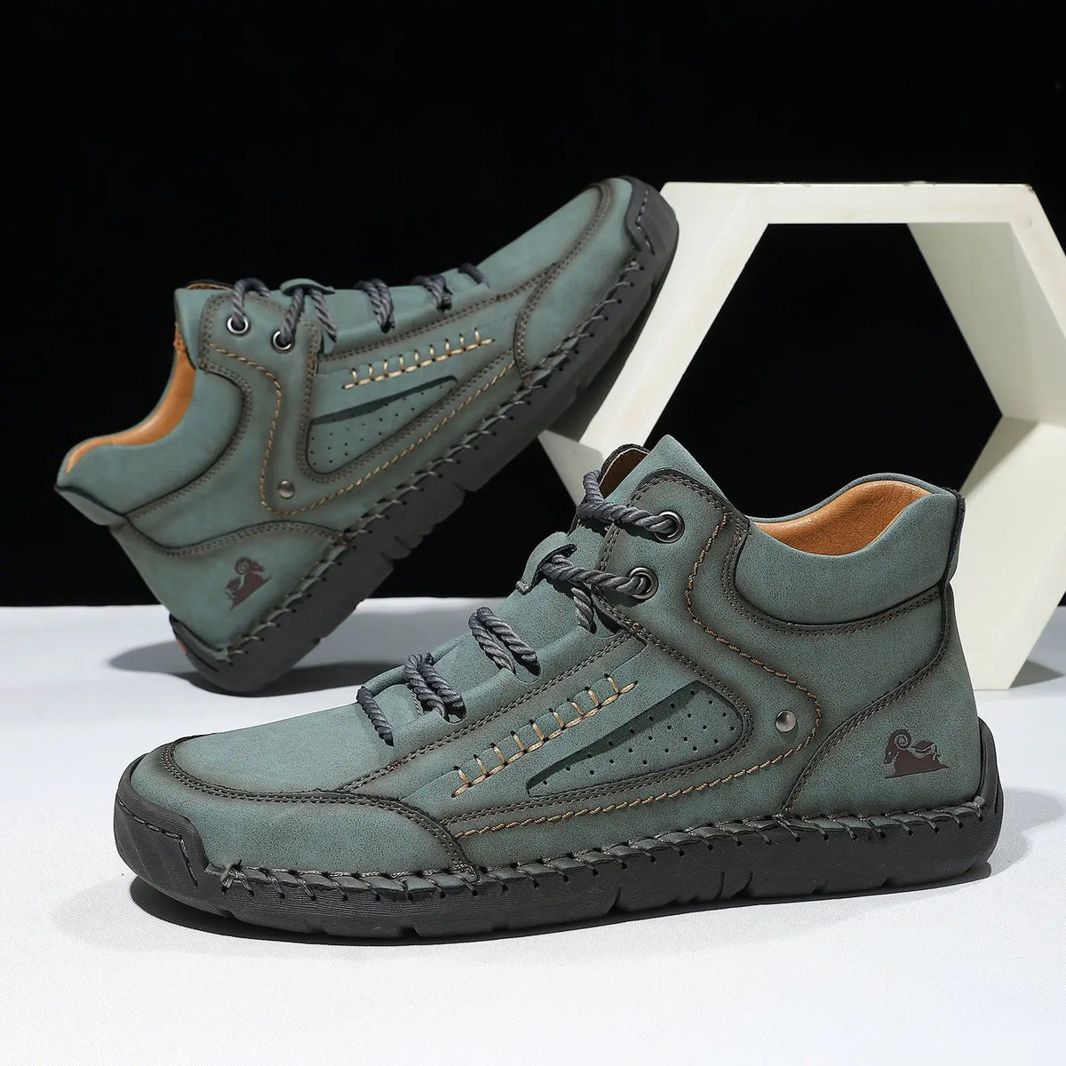 Mens comfortable and breathable flat-laced high-top shoes by AdTec in teal suede with a black sole.