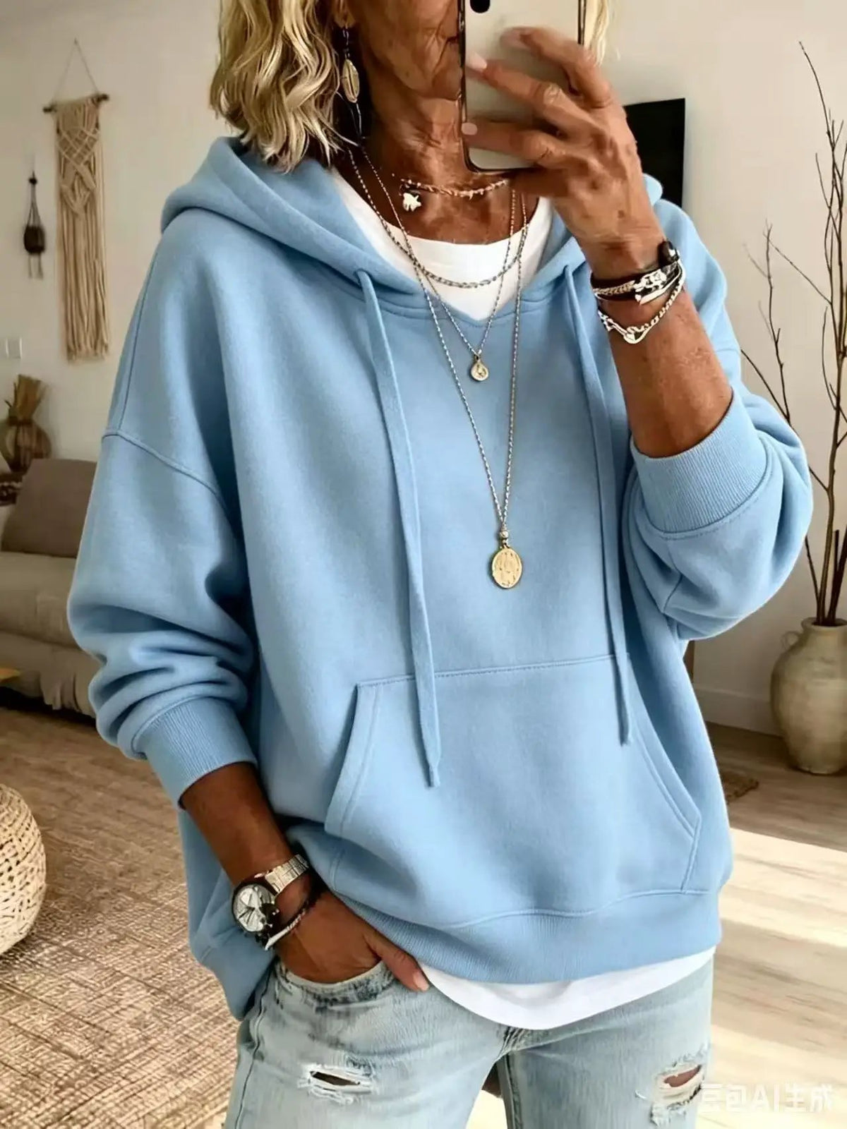 Womens blue AdTec hoodie with a loose fit and front pockets, long sleeves