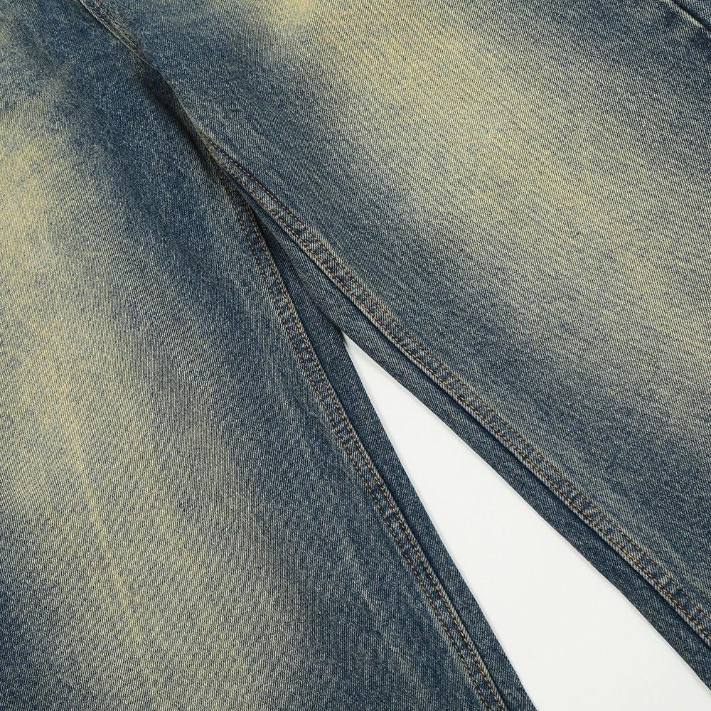 Color blocked yellow mud dyed washed denim jeans by eprolo