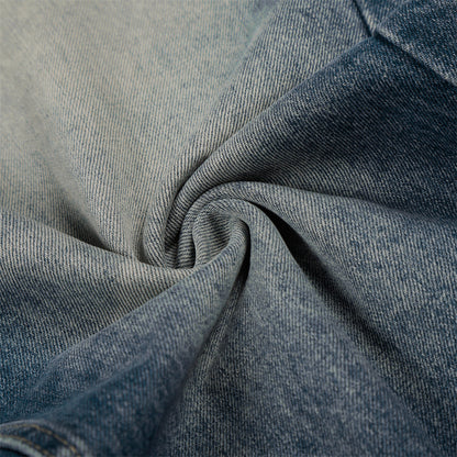 Jean en denim délavé et poli à blocs de couleur