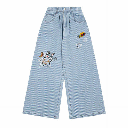 Pantalones vaqueros con diseño deconstruido, a rayas, con paneles y costuras curvas, y efecto lavado