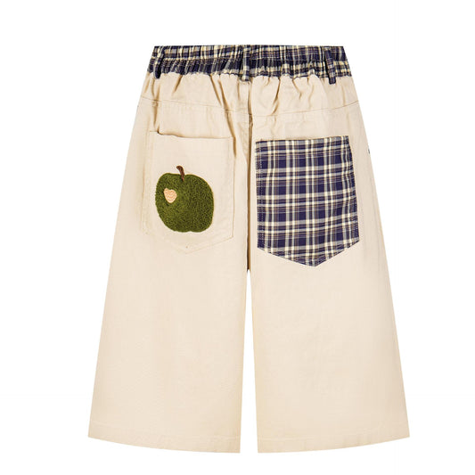 Rehaussez votre garde-robe décontractée avec ce superbe short large