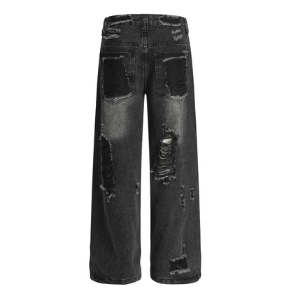 Distressed wide-leg jeans in heavy-wash black denim with large back patches, unisex oversized floor-length by eprolo