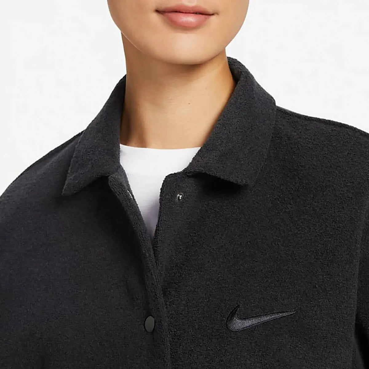 Nike Authentic SPORTSWEAR women's terry cloth long sports jacket in black with a subtle swoosh logo