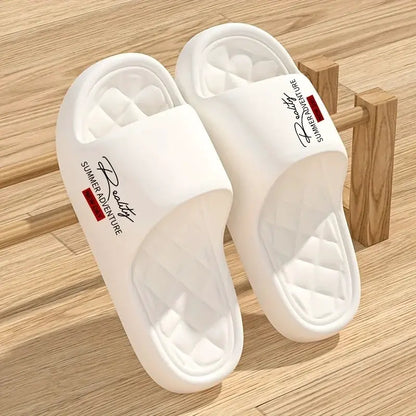 White EVA men's slippers, lightweight summer slides with quilted footbeds, pair shown for indoor and outdoor use