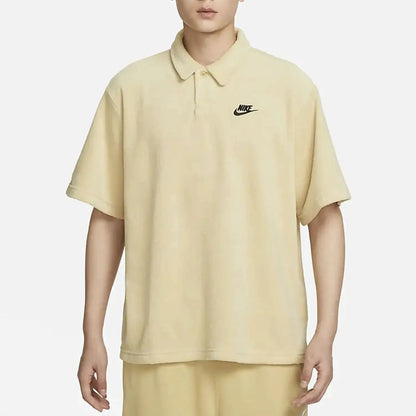 Nike beige men's polo shirt with collar and chest logo