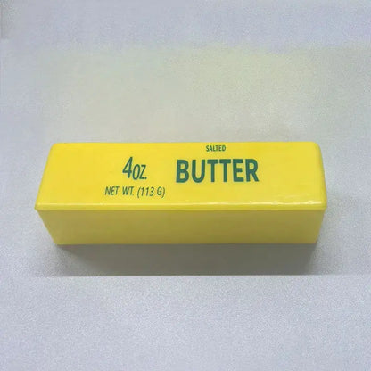 Yellow butter packaging box labeled 4oz salted butter.