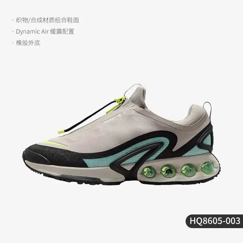 Nike Air Max Dn Roam men's low-cut sneaker in beige/gray with neon yellow laces and lime-green air units