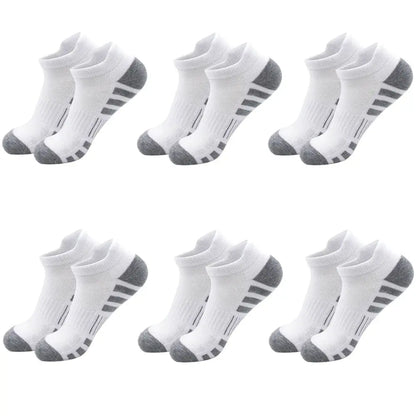Breathable cushioned athletic ankle socks, set of six white socks with gray toes and heels.