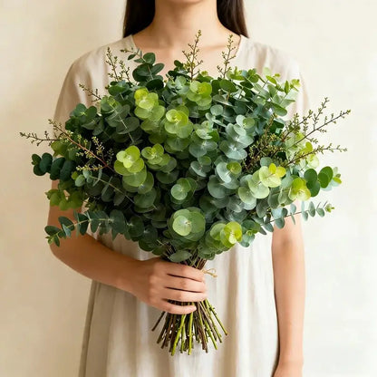 Artificial eucalyptus bouquet, 26 green round leaves, hand-tied for home decor and arrangements.