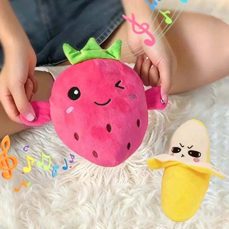 Two-piece kawaii plush fruit set: pink strawberry with green crown and yellow banana toys with musical notes