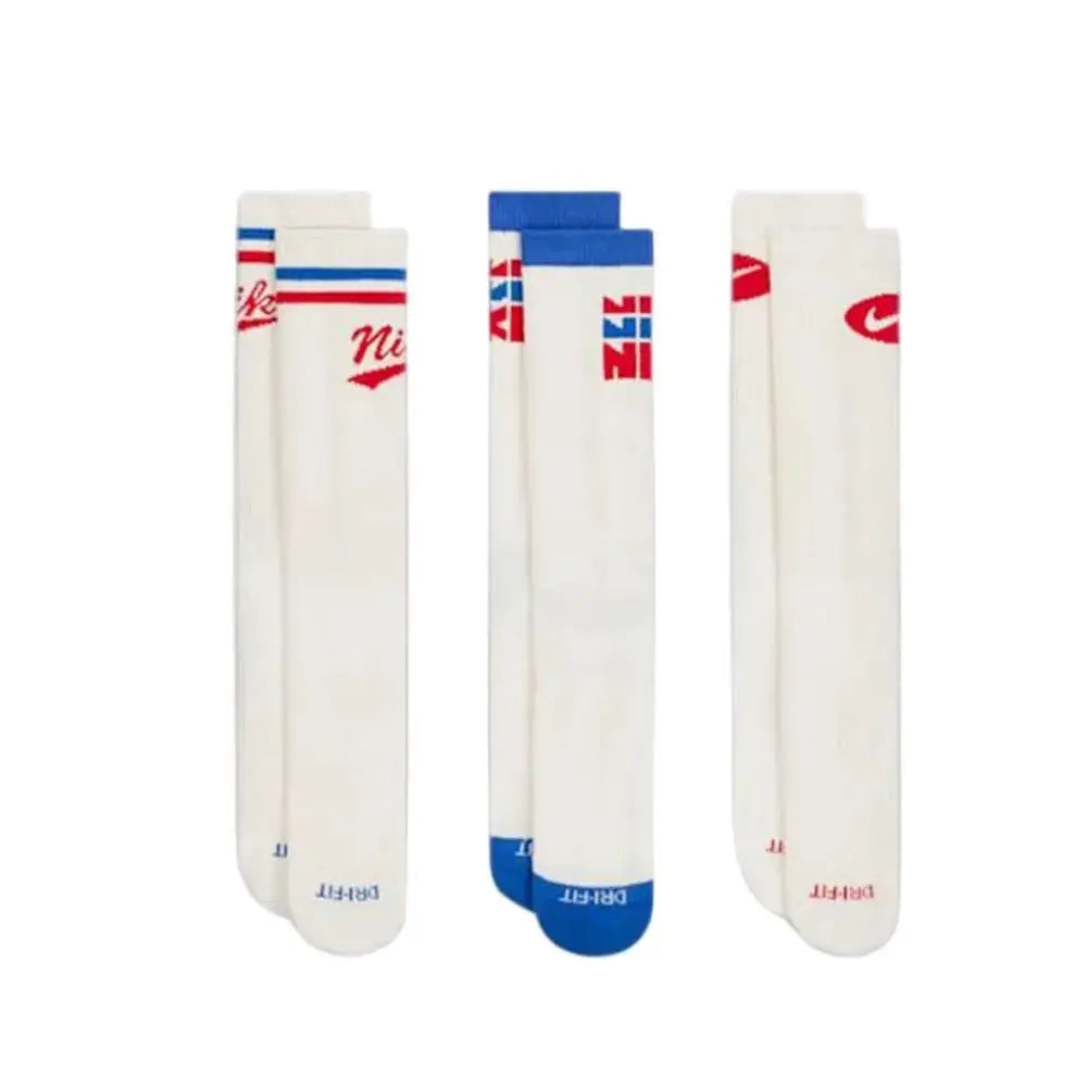 Nike Everyday Crew socks 3-pack; white Dri-FIT athletic crew socks with red and blue Nike branding.