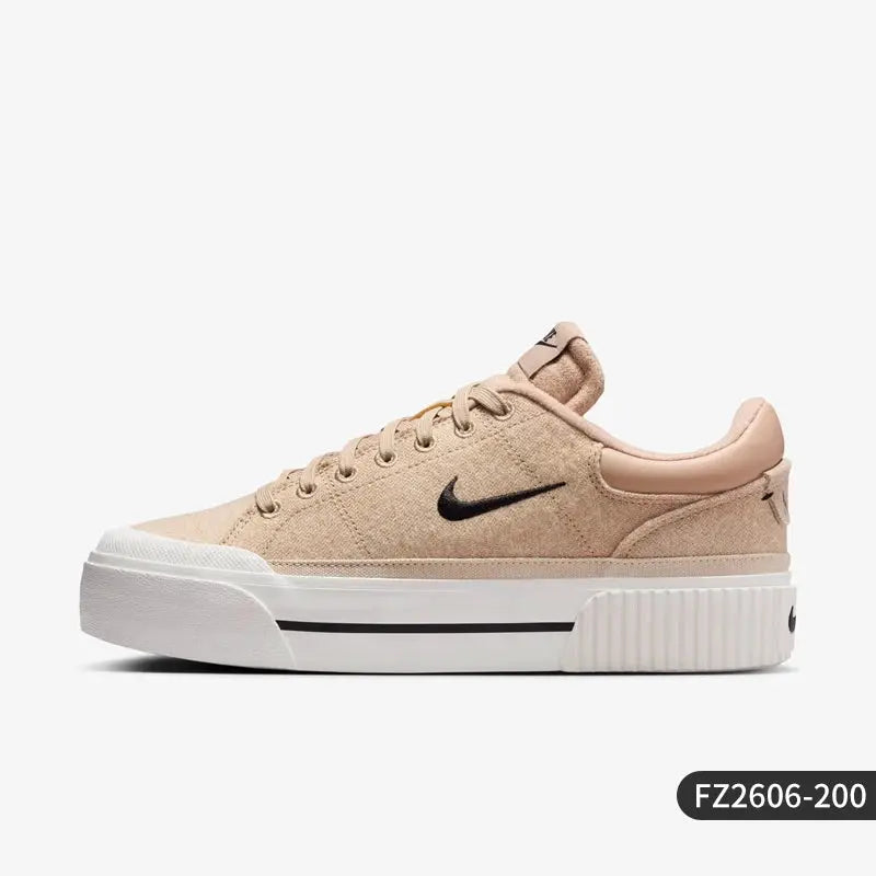 Nike Court Legacy Lift women's casual sneakers, tan suede upper, white platform sole with black swoosh.