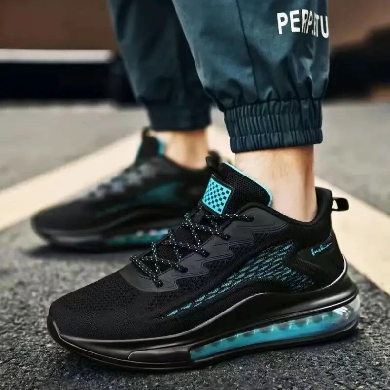 Men's black breathable running sneakers with teal accents and blue air-cushioned midsole