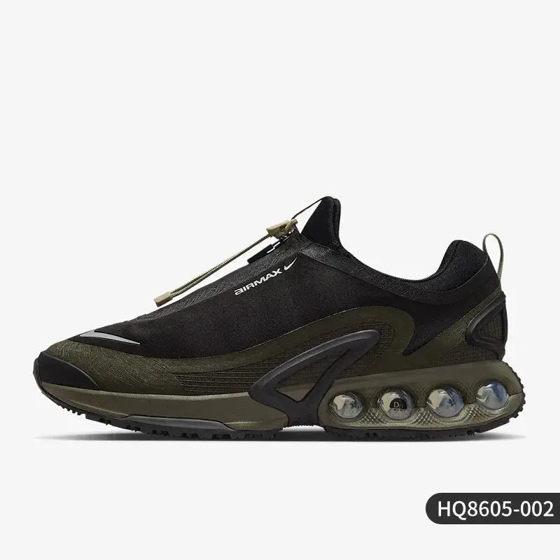 Nike Air Max Dn Roam men's low-cut sneaker in black and olive with visible Air Max unit.