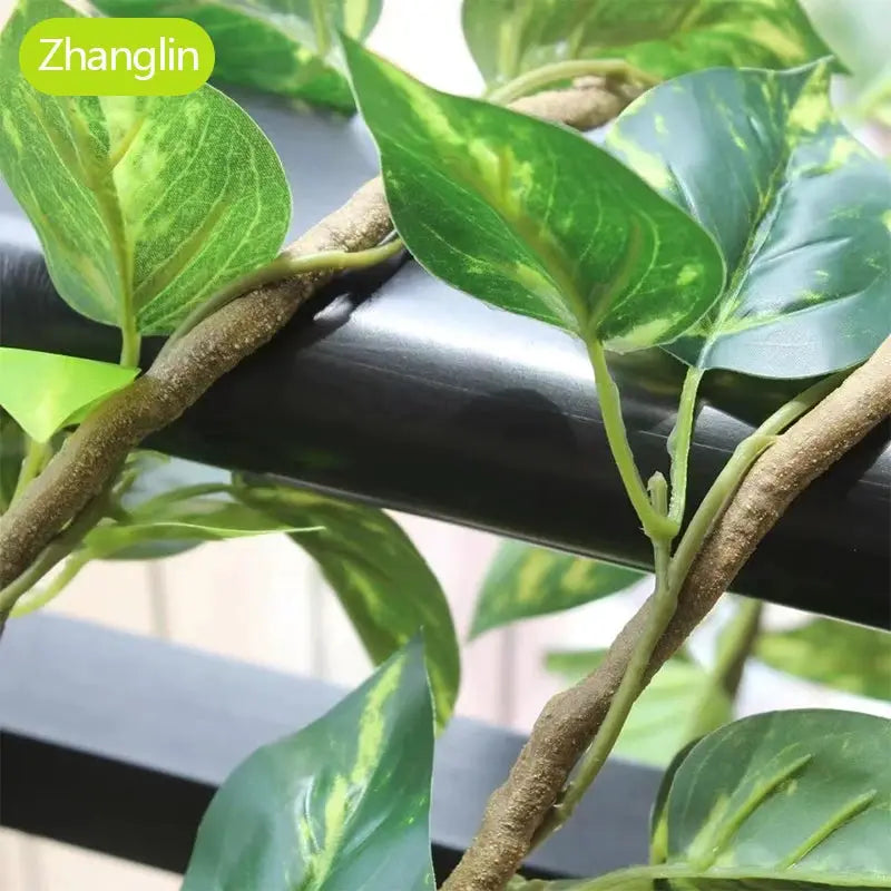 Artificial trailing plant with green variegated leaves and brown stems, Zhanglin logo visible
