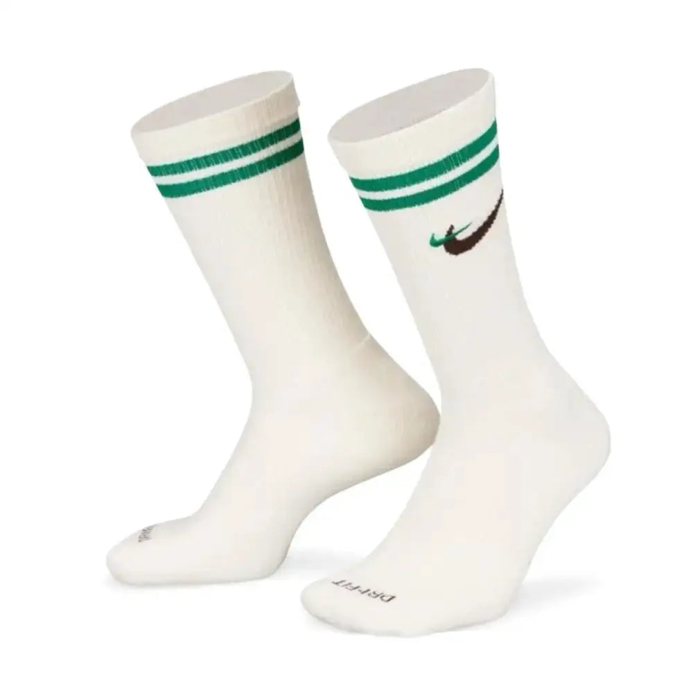 Nike Everyday Crew unisex basketball socks, 3-pack, white with green striped cuffs and Nike swoosh