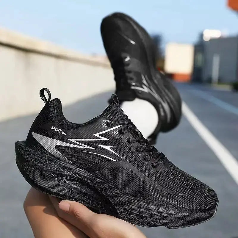 Marathon Men Sports Running Shoes, black mesh pair with white zigzag side accents.