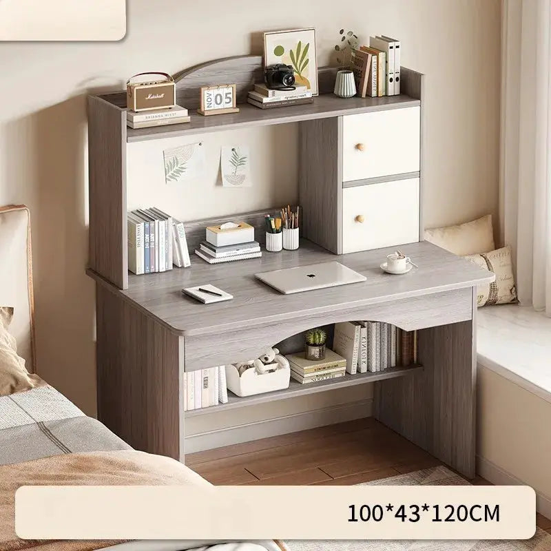 Home desk bookcase with integrated desktop in grey wood finish and white drawers.