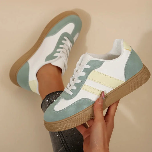 Assorted colors retro sports women's sneakers with white uppers, pastel teal overlays, and gum soles