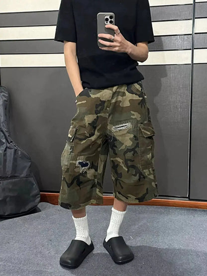 Mens plus-size camo cargo denim shorts with distressed details