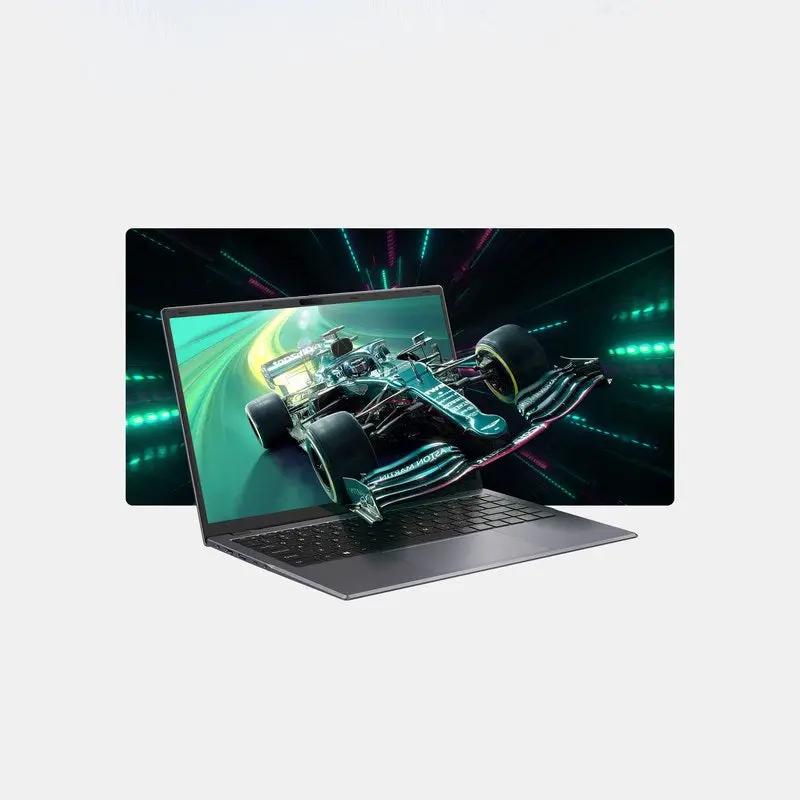 Laptop with metallic gray body displaying a vivid racing car graphic on its screen