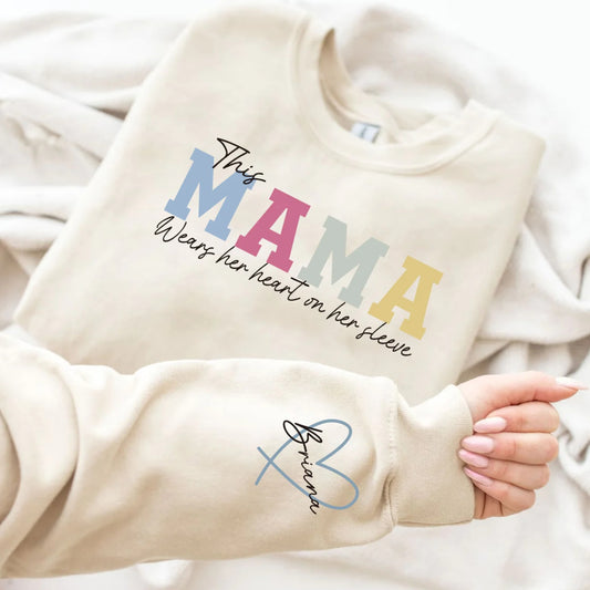 A Custom Hot Stamping Printed Hoodie by AdTec; beige hoodie with pastel multicolor MAMA lettering and script slogan