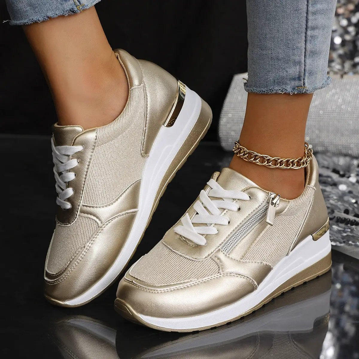 Women's FFashion lace-up sneakers with side zipper; metallic gold upper and thick white sole
