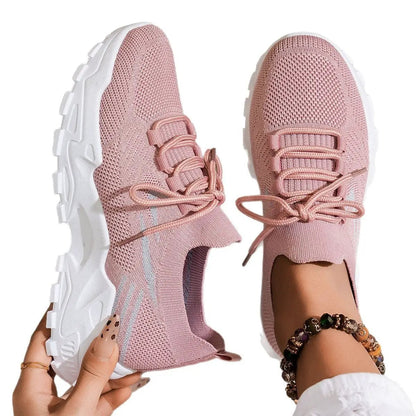 Women's pink knitted sport shoes with chunky white sole and laces