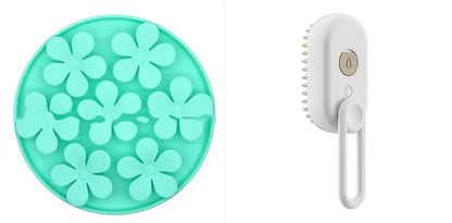 AdTec 2-piece Cat Steam Brush 3-in-1 pet grooming set: turquoise silicone pad with flower shapes and white handheld brush