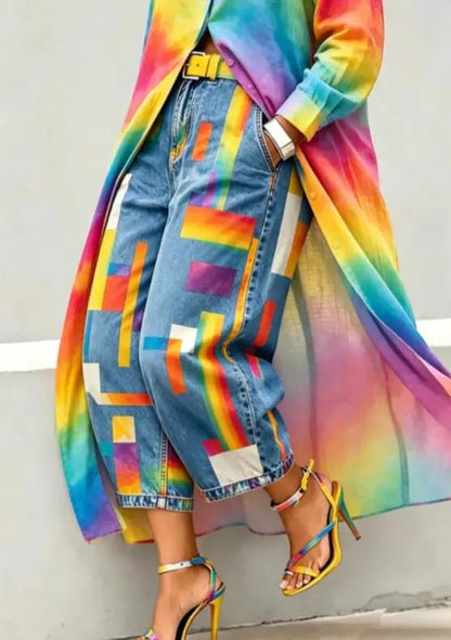 Capri denim pants with bold color-block patchwork; mid-rise, wide-leg fit