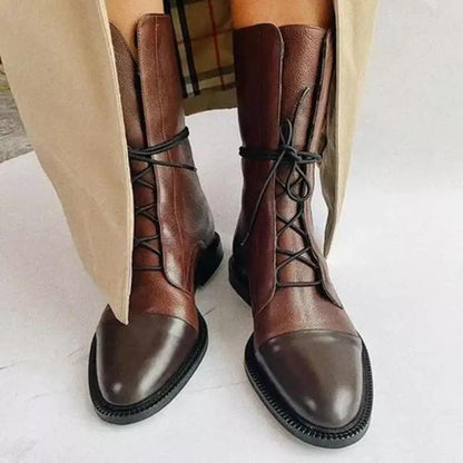 Paire de bottes mi-mollet imperméables à plateforme en cuir brun avec lacets noirs
