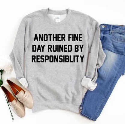 Another Fine Day Sweatshirt by PrimeCanada.Store, gray with bold black text; part of a 3-piece outfit with blue jeans and beige flats