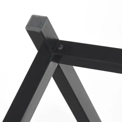 L-shaped desk frame in black metal with square-tube legs and bolt joint.