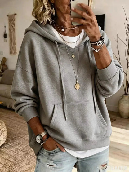 Womens gray loose-fitting hoodie with pockets and long sleeves