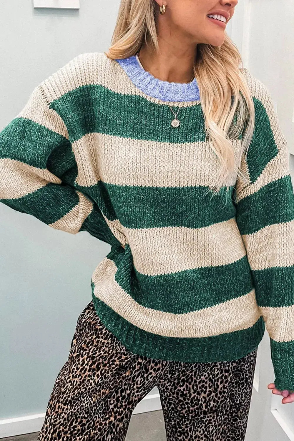 Striped colorblock drop-shoulder pullover sweater in green and cream with ribbed hem, soft stretch knit, oversized fit