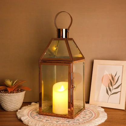 16 inch High Decorative Lantern with copper-gold finish and glass panels