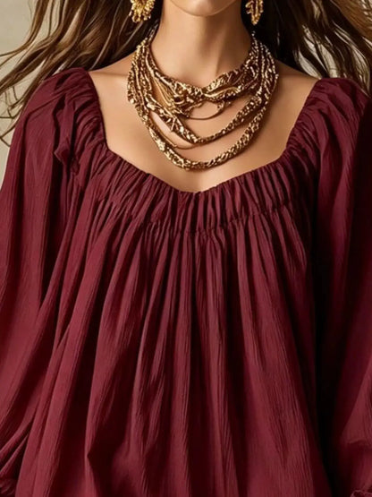 Flowy Balloon Sleeve Mini Dress in burgundy with a gathered bodice