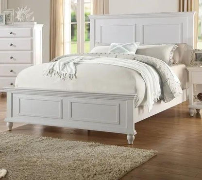 White queen size bed with high panel headboard, part of a bedroom furniture set
