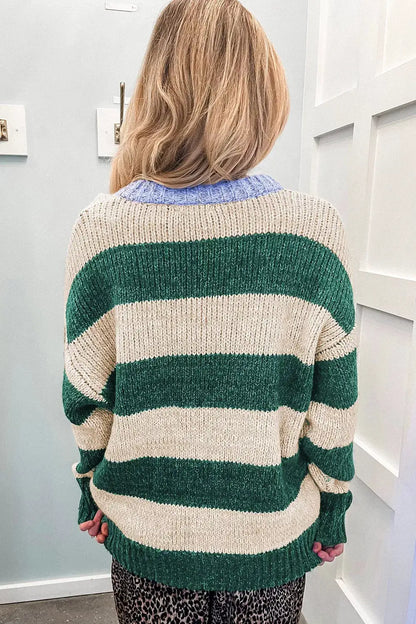 Striped colorblock drop-shoulder pullover sweater with beige and green stripes and blue ribbed collar.