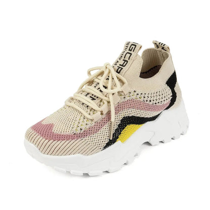 AdTec women's knit sneakers with beige upper and chunky white sole.