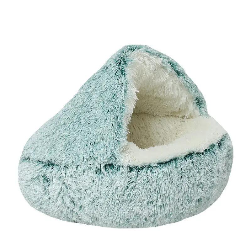 Crystal velvet warm round cat bed by AdTec in teal with cream plush interior