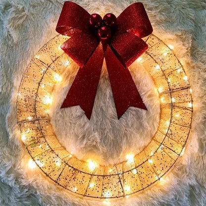 Christmas luminous LED wreath, 50cm golden metal ring with warm white lights and a large red bow