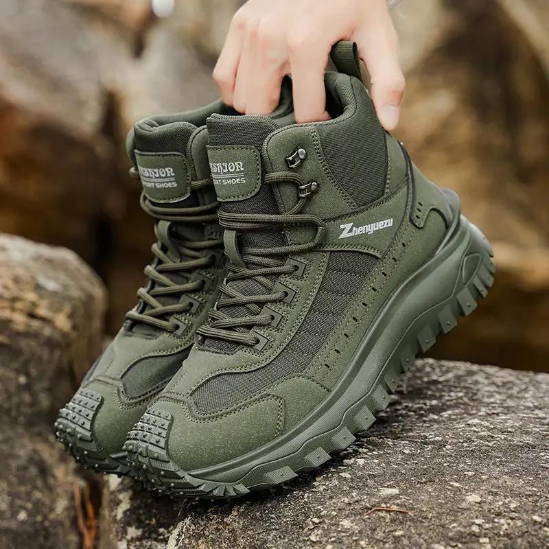 Pair of olive-green outdoor hiking boots with thick rugged soles