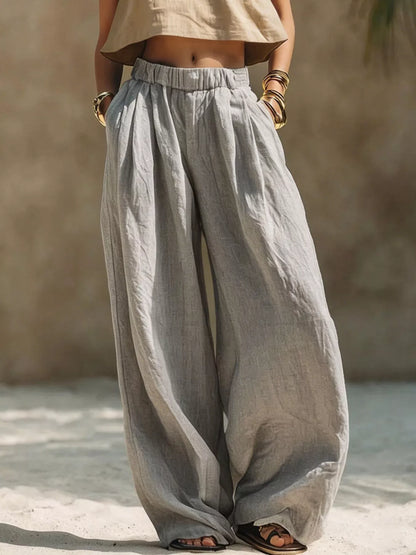Full Size Elastic Waistband Wide Leg Palazzo Pants by Trendsi, plus size, with drawstring and pockets, light gray