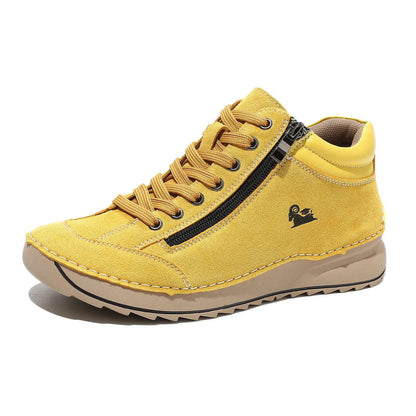 Women's yellow flat dress shoe by AdTec with laces and side zipper, suede upper.