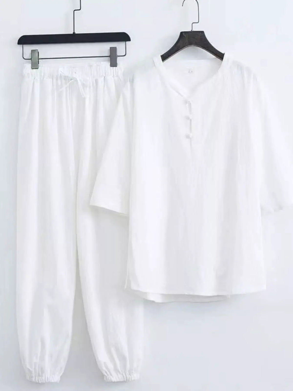 Men's plus-size Chinese-style pajama set in white with mandarin-collar top and elastic-cuffed pants