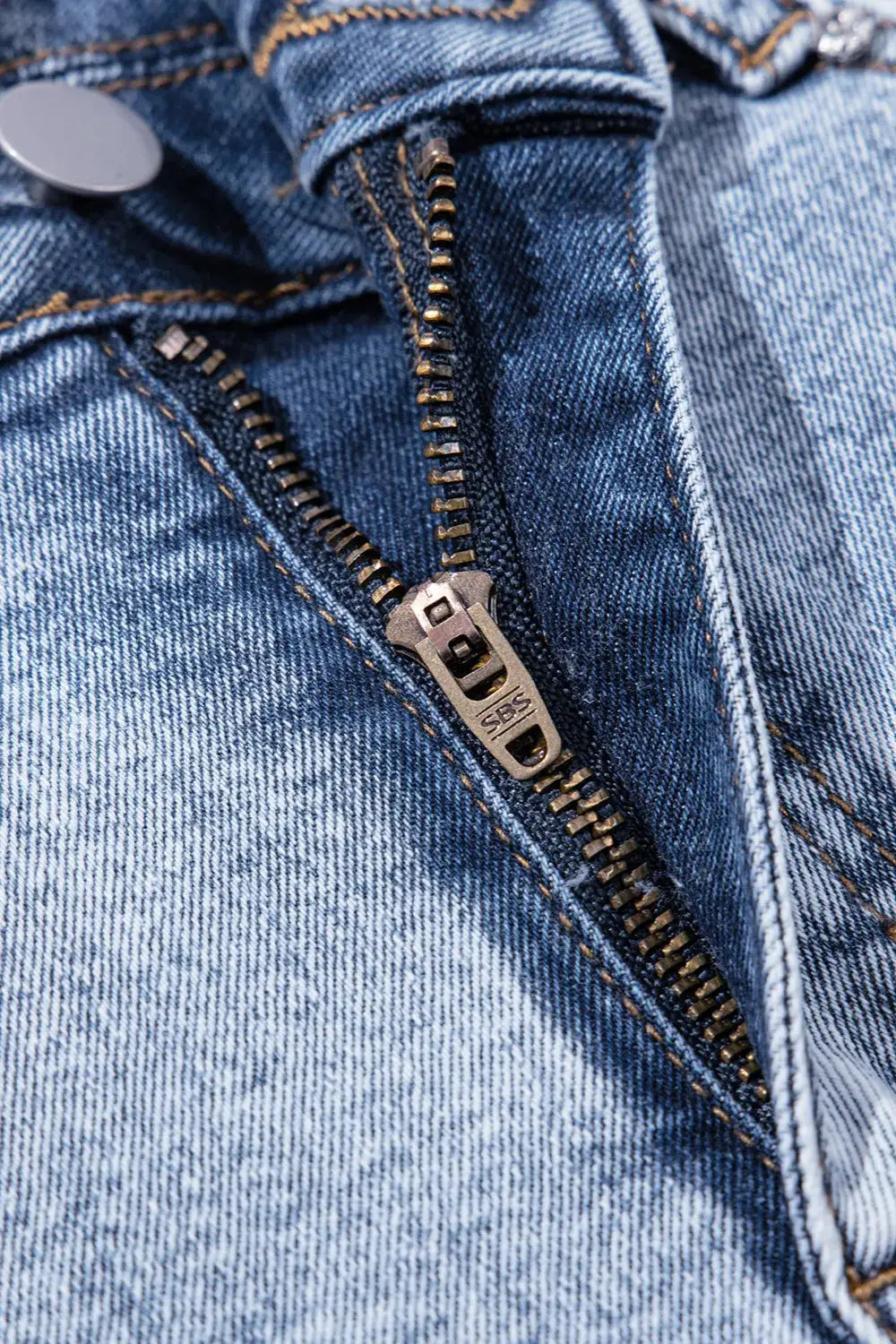 Women's high-waist light-wash denim shorts with metal SBS zipper detail
